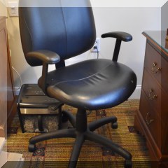 F31. Leatherette office chair. Some peeling on seat. 44” h x 24”w - $48